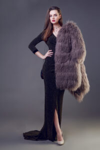 gorgeous-brunette-woman-with-red-lips-wearing-furry-coat-cocktail-dress-posing